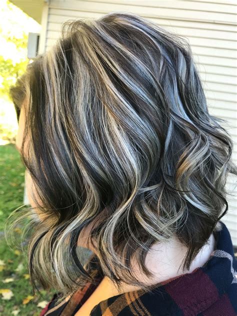 short dark hair with blonde highlights|dark hair with blonde accents.